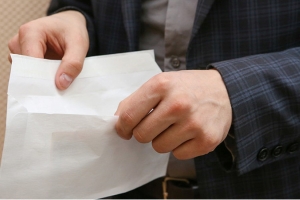 Зарплату в конвертах получали более 4 тыс. водителей. Аферы в таксопарках раскрыли в столице и Минской области